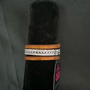Brown leather bracelet with white and copper bling